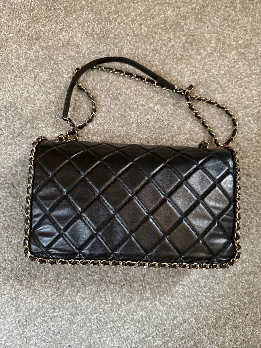 CHANEL Black Quilted Leather Shoulder Bag with Gold Hardware